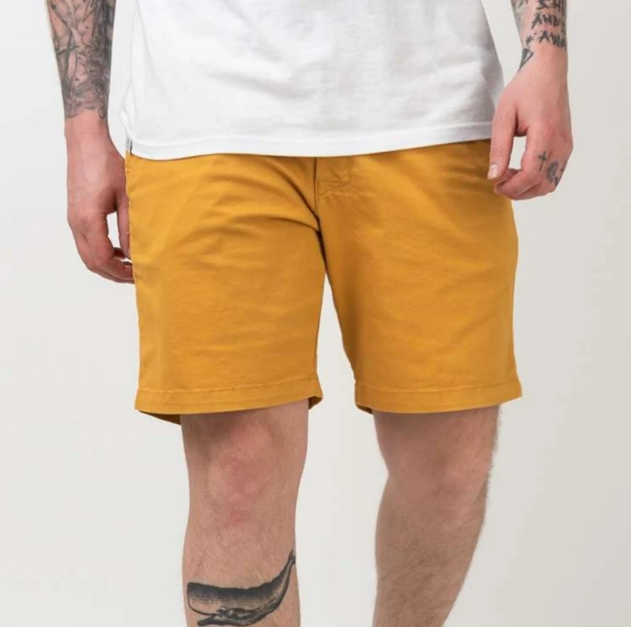 REELL BERMUDA  FLEX CHINO MOSTAZA